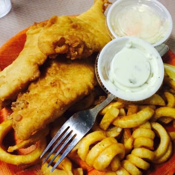 Tarks Of Dania Beach - Dania Beach, FL, United States. Beer battered fried fish with curly fries