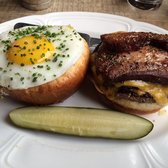 Au Cheval - Chicago, IL, United States. Au Cheval's cheeseburger with thick cut bacon, a sunny side up egg, garlic aioli mayo, and pickles. Absolutely perfect!