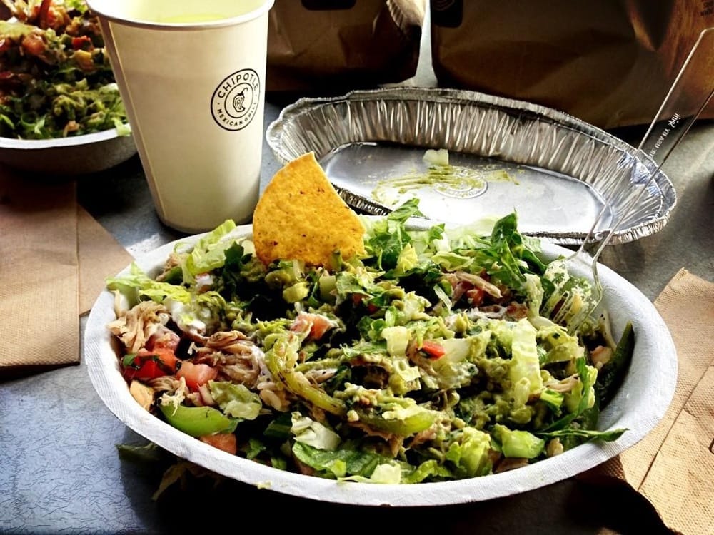 Carnitas burrito bowl with brown rice, grilled veggies, mild salsa