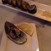 Kai Zan - Chicago, IL, United States. 8th & 9th dish (of 10-course Omakase): dynamite mussel & fiesta maki roll (tuna, salmon, jalapeño, avocado)
