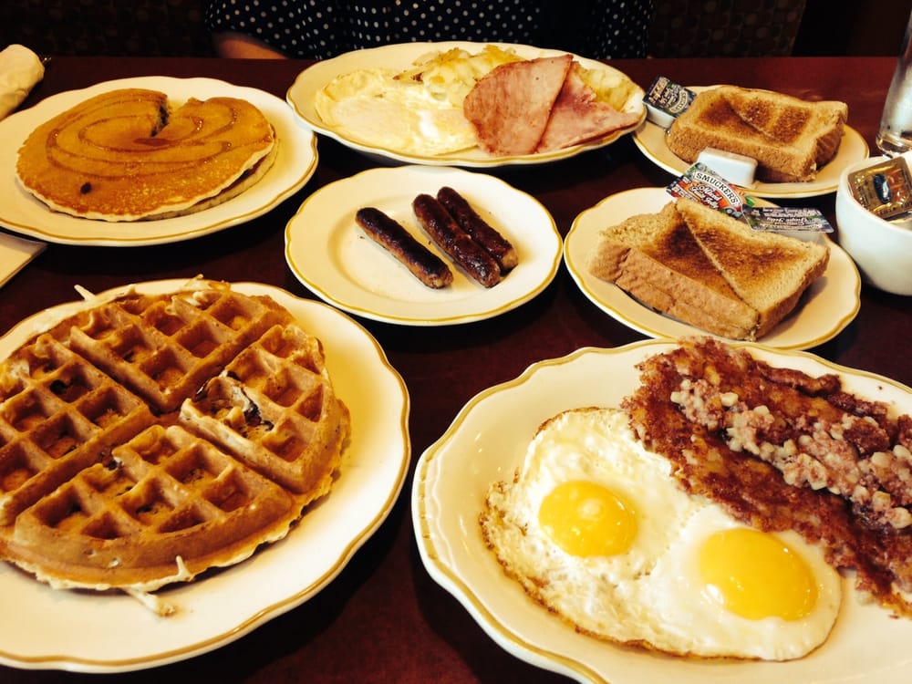 Yummy breakfast! Candied pecan waffle, blueberry pancakes, 2 eggs over