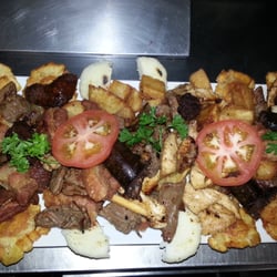 Mi Latin Kitchen logo