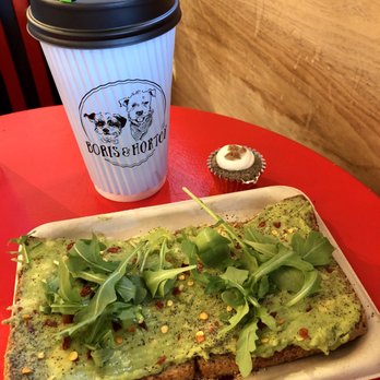 Photo of Boris & Horton - New York, NY, United States. Small Lemon + Ginger Tea ($2.50), Maison de Pawz Pupcake ($2.75), and Gluten Free Avocado Toast ($13).