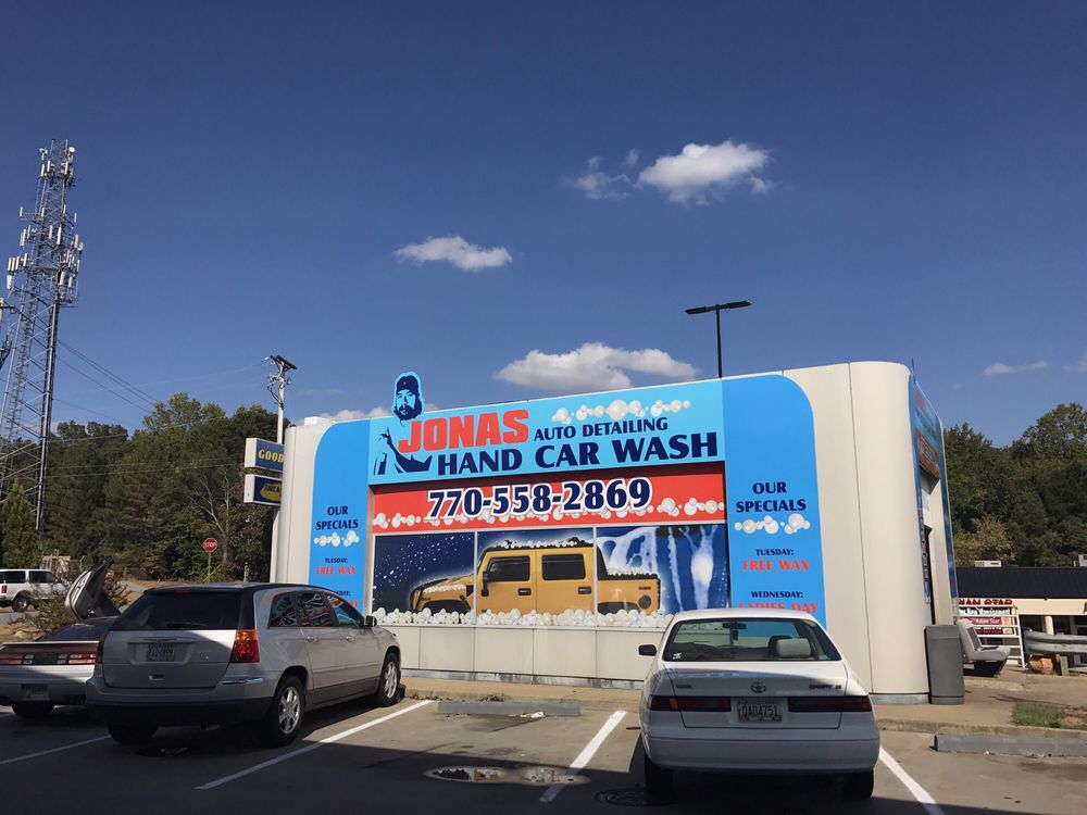 side view of the car wash they are using an old automated bay of an