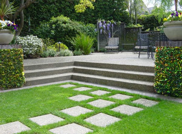Exposed aggregate concrete pavers traverse the lawn to ... Exposed aggregate concrete pavers traverse the lawn to ... on Backyard Ideas Concrete And Grass id=71703