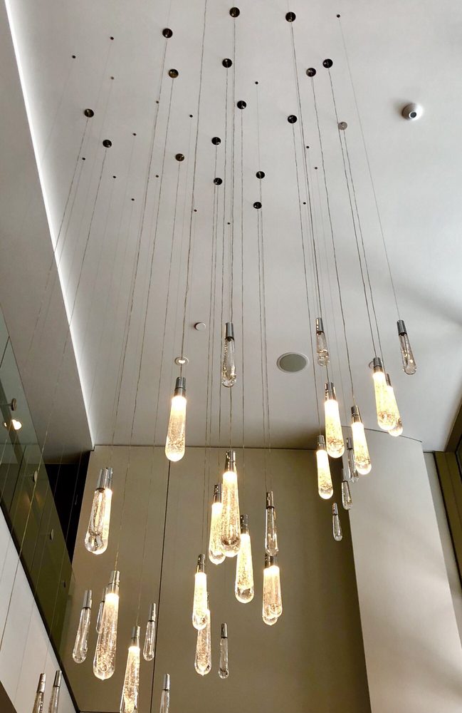 Light Fixtures At Adjacent Hotel Lobby Yelp Photo Of All Water Seafood Oyster Bar Seattle Wa United States
