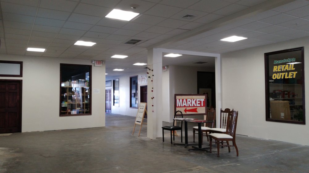 At Entrance Into Basement There Are Chairs And Table