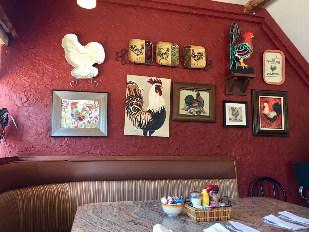 Chicken themed decor. Very cute restaurant! Yelp