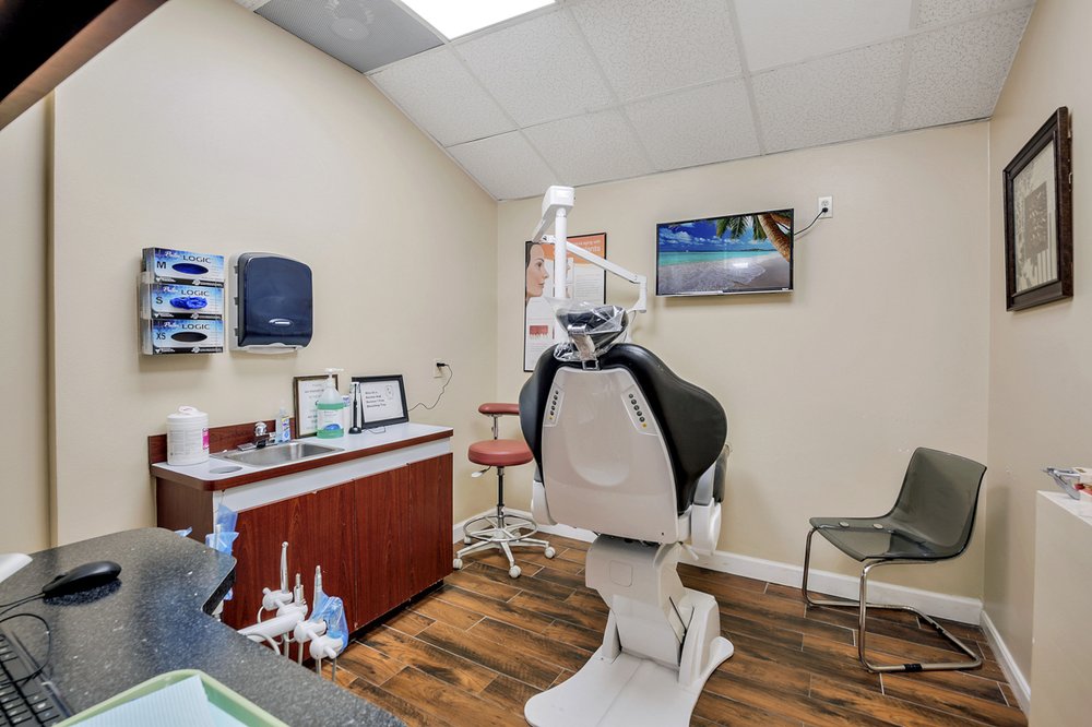 image of business Trinity Dental Centers - Normandy