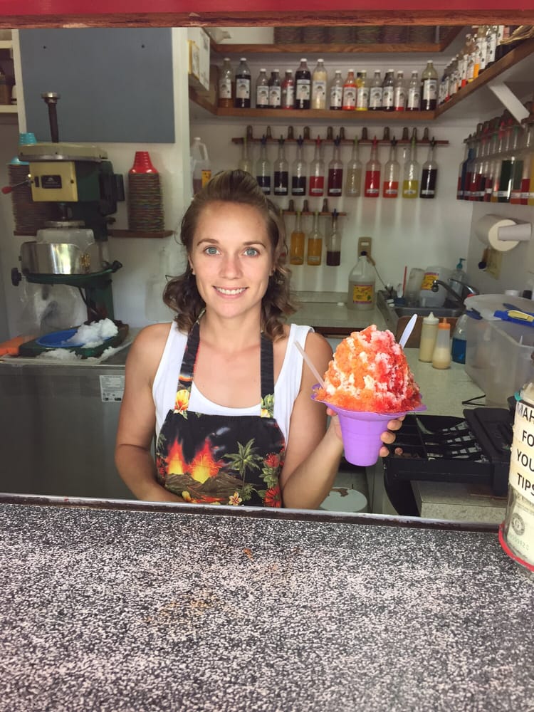 Cute Lil cashier with my snow cone!! Love this place! Yelp