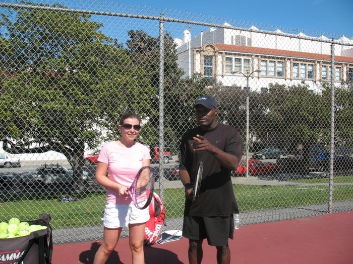 Tennis Lessons By Mcclain - San Francisco, CA, United States. Tlking with a client