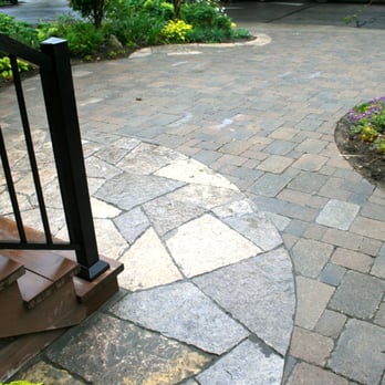 front yard parking pad with tumbled interlocking brick pavers and front yard parking pad with tumbled interlocking brick pavers and