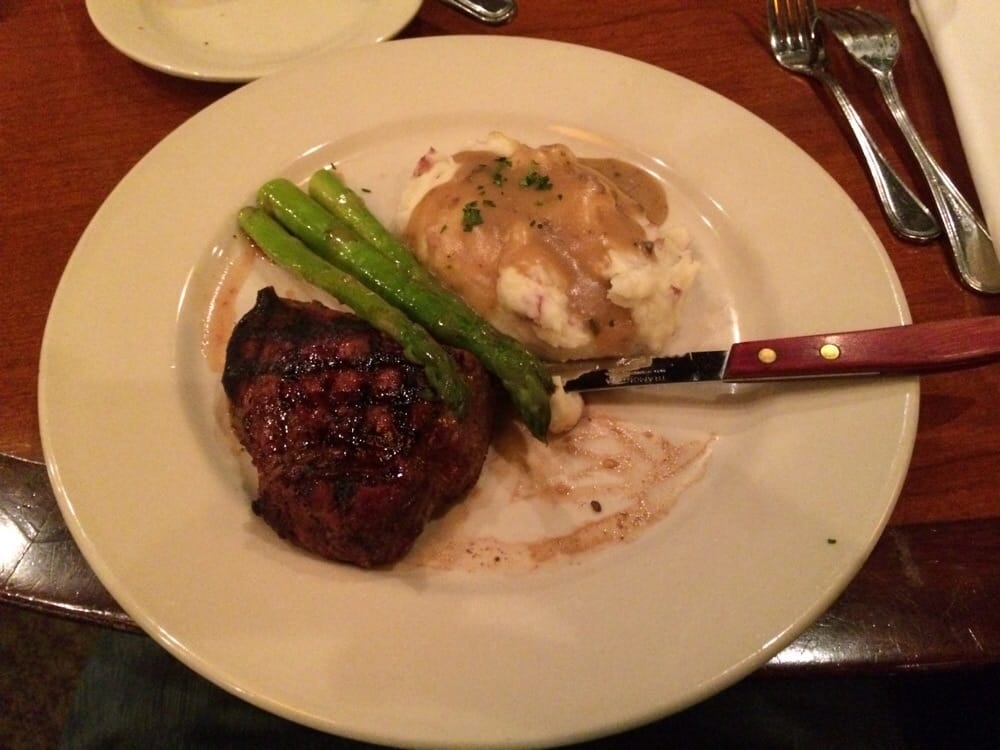 Yum! The business steak lunch. Sirloin steak, asparagus, and mashed potatoes with porcini Yum! The business steak lunch. Sirloin steak, asparagus, and mashed potatoes with porcini
