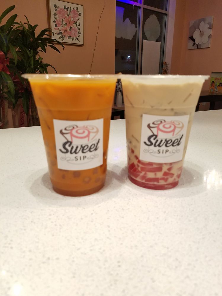 Thai tea w/ white honey boba, Jasmine milk tea with strawberry jelly - Yelp