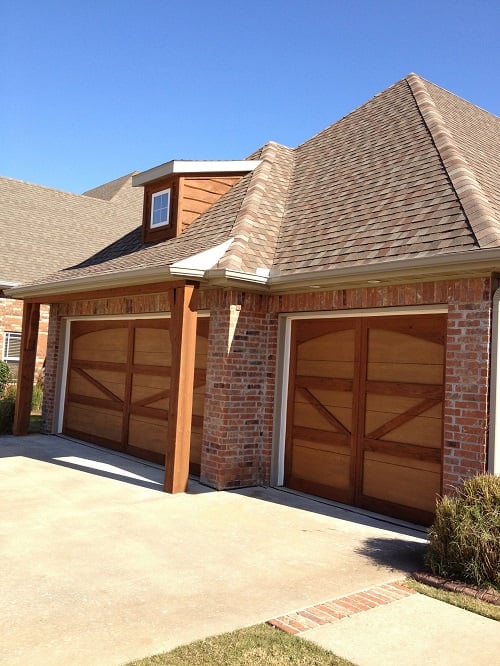 These Stained Wooden Garage Doors And Dormer Stand Out Beautifully Photo Of Certapro Painters Fayetteville Ar United States These Stained