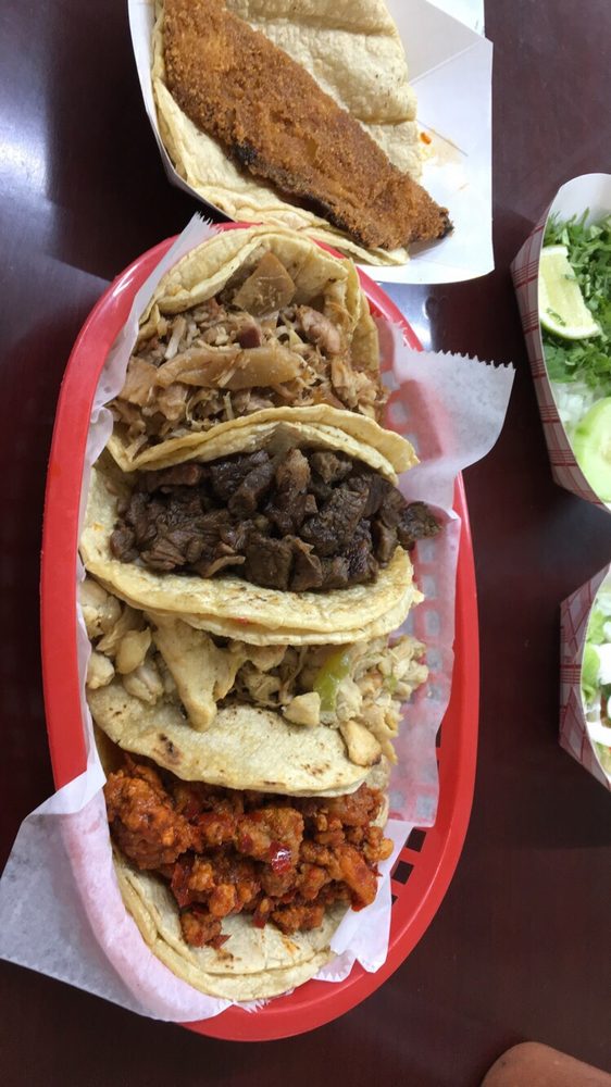Photo of Carniceria El Ranchito - Indianapolis, IN, United States. Left to right: fish, pork, asada, chicken, pastor