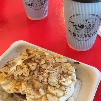 Photo of Boris & Horton - New York, NY, United States. Labneh with bananas, honey, cinnamon, and almonds on banana bread