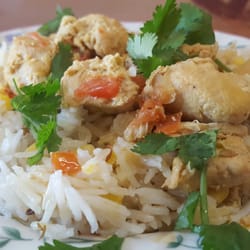 Photo of Shalimar Curry House - Columbia, SC, United States. Curry chicken over biryani