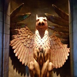 Inside Hogwarts, in line for the coolest ride. You have to go on it, you'll be blown away...