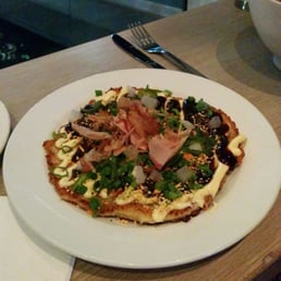 The okonomiyaki has the right idea but cheaper out on content. (Japanese style has meat + cabbage, this was just yam & dough)