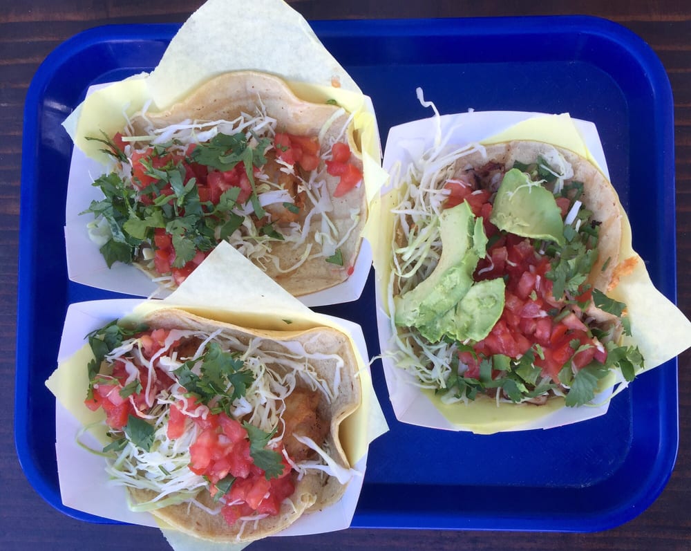 Left: Fish Taco, Right: Grilled Octopus Taco - Yelp
