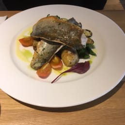 Char fish with potatoes, eggplant and asparagus