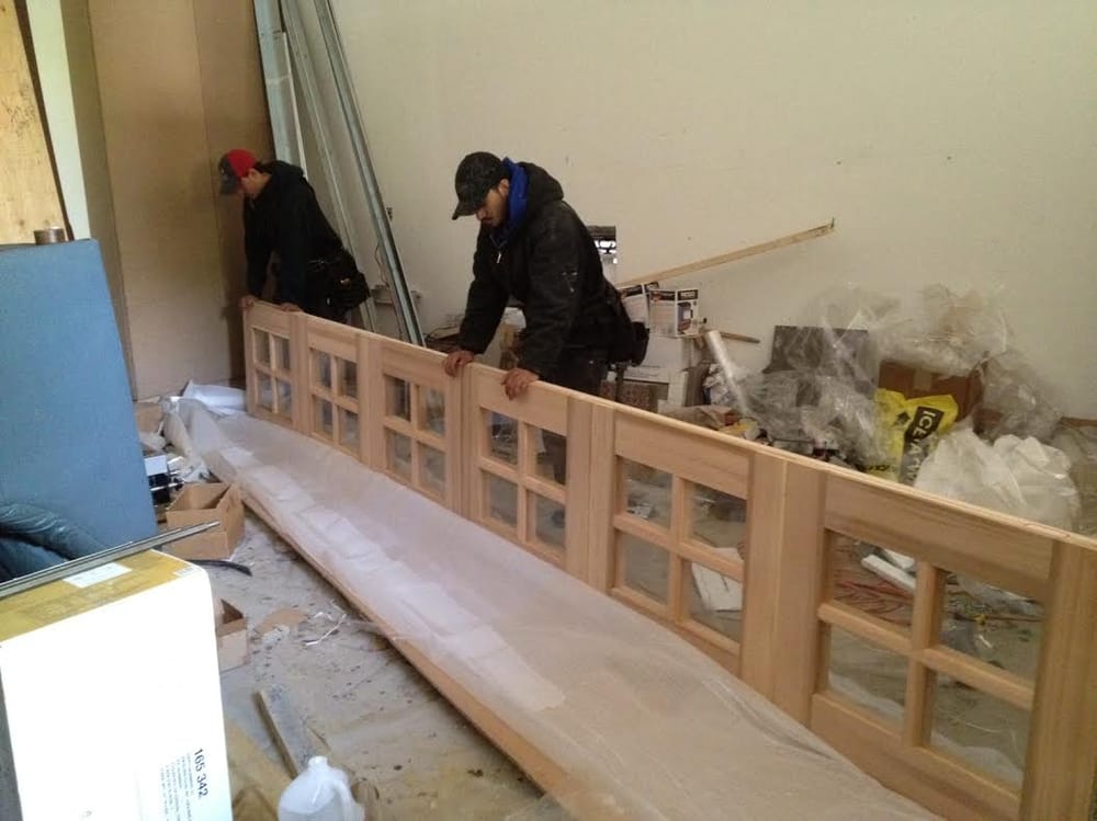 Installing A Custom Wood Garage Door With Roof Pitch 3 Inch Track Photo Of Roberts Garage Door Professionals Chicago Il United States