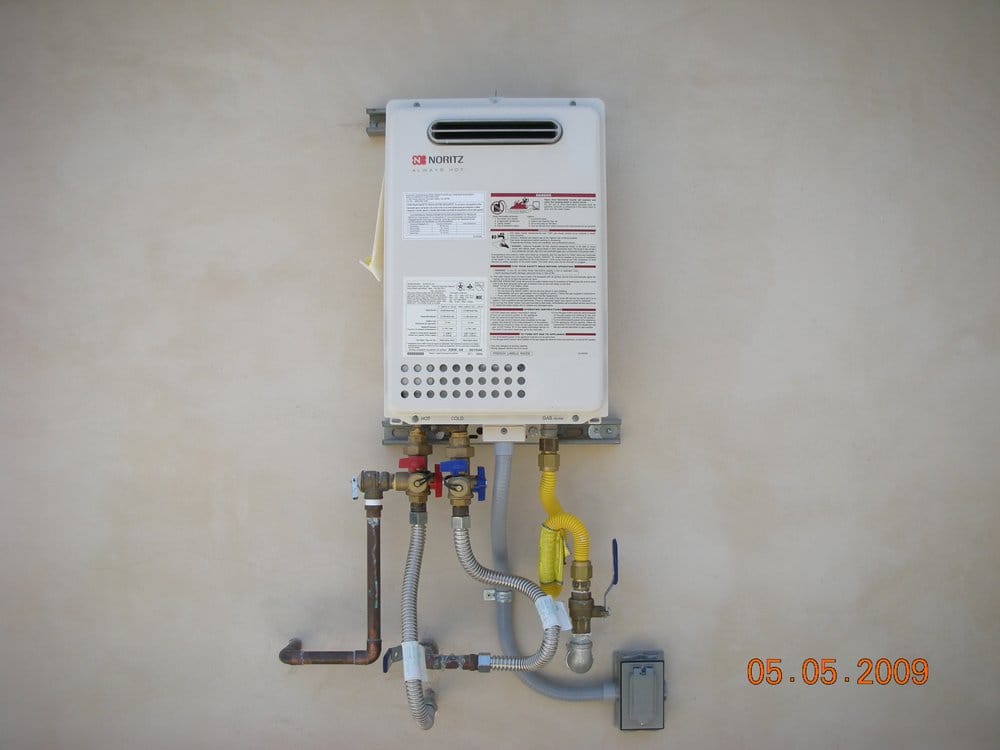tankless water heater installed on exterior wall yelp