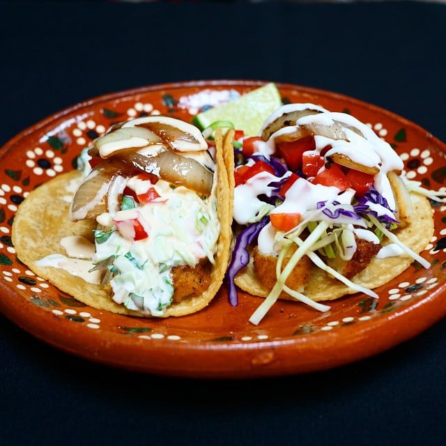 Fish tacos, one of the many types of tacos we offer. Yelp