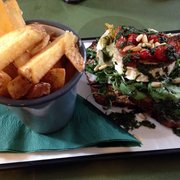 Photo of Honeycomb Bakery & Cafe - Dublin, Republic of Ireland. Goats cheese pesto and sundried tomatoes on bread with unreal fluffy chips