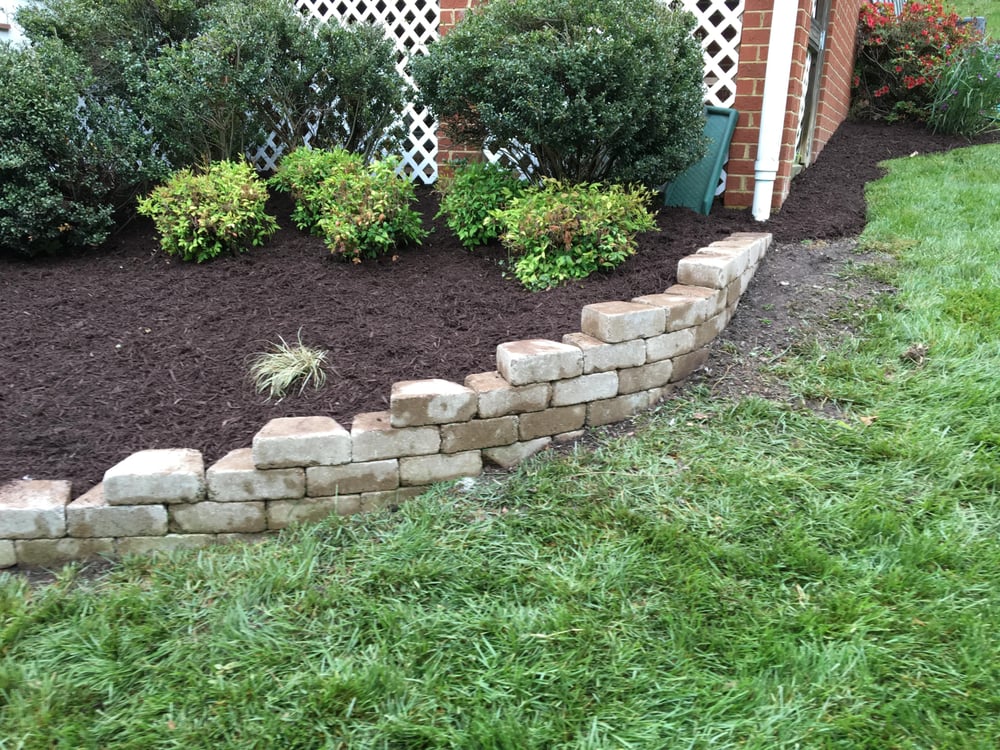 Stepped Wall Up The Steep Slope To Keep It Level Bonding Agent Used Photo Of Austin S Lawn Care Landscaping Mechanicsville Va United States Stepped