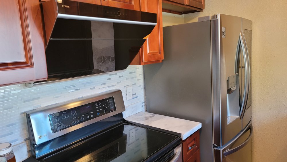 Luxe Cabinet and Stone