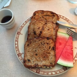 Moon and River Cafe - Schenectady, NY, United States. Vegan French toast with watermelon slices and a cup of coffee!