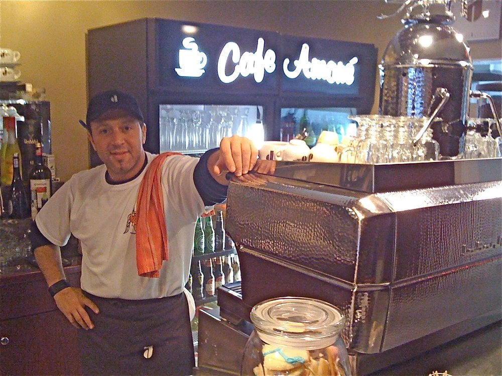 Owner Cristo poses with his magic espresso maker! Yelp