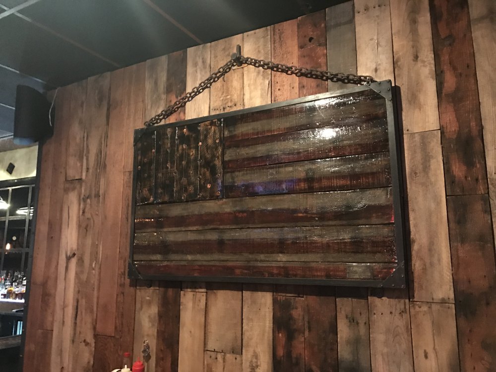 Custom flag by Brass Junkie. Yelp
