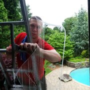 Window Cleaners Woburn  Cleaning a storefront Photo of Fish Window Cleaning - Woburn, MA, United States.