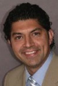 Omid Vesal,MD