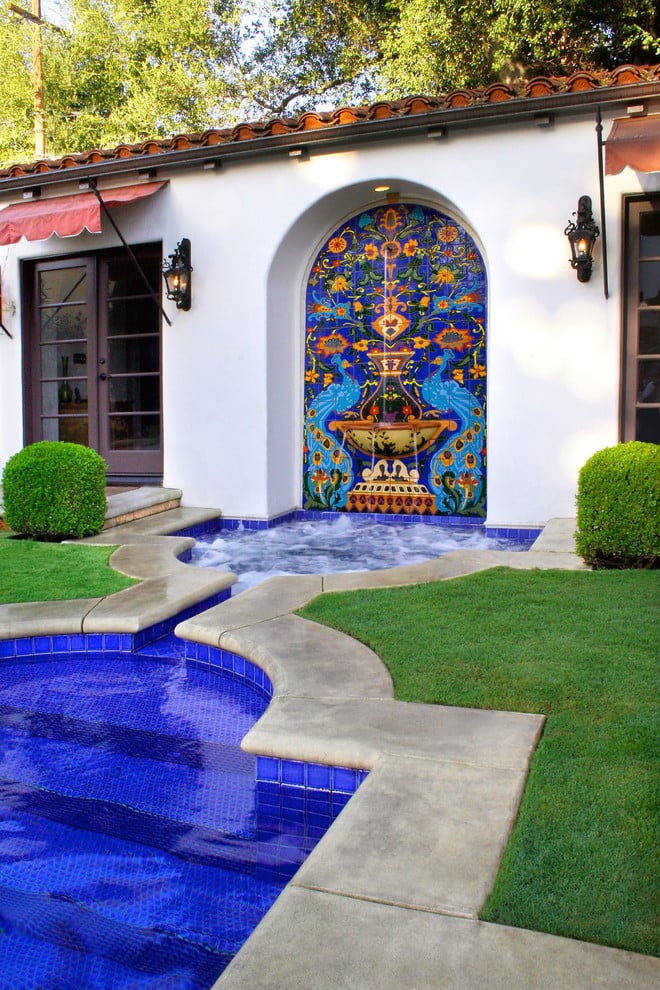 Spanish spa wall fountain designed by LUXE H20. Yelp