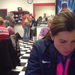Memories Pizza - Walkerton, IN, United States. Inside the pizzeria using my iPad camera.  Not a seat or booth empty at this time (8pm).  Crystal can be seen behind the counter.