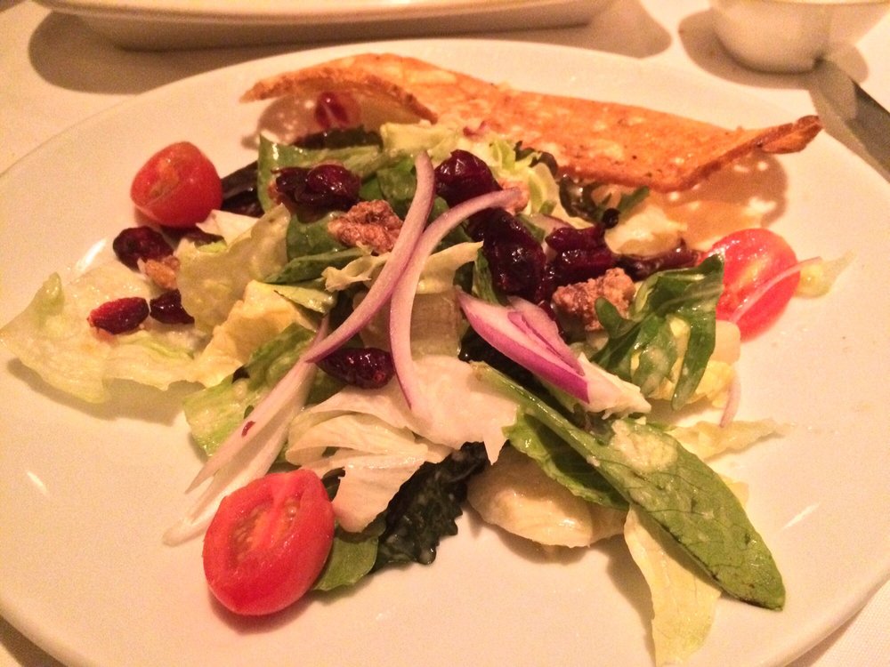 Fleming's salad. Halfed cause we shared it - Yelp