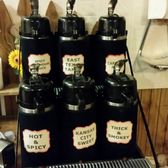 Photo of Marshall's Bar-B-Q - Farmers Branch, TX, United States. Assorted sauces