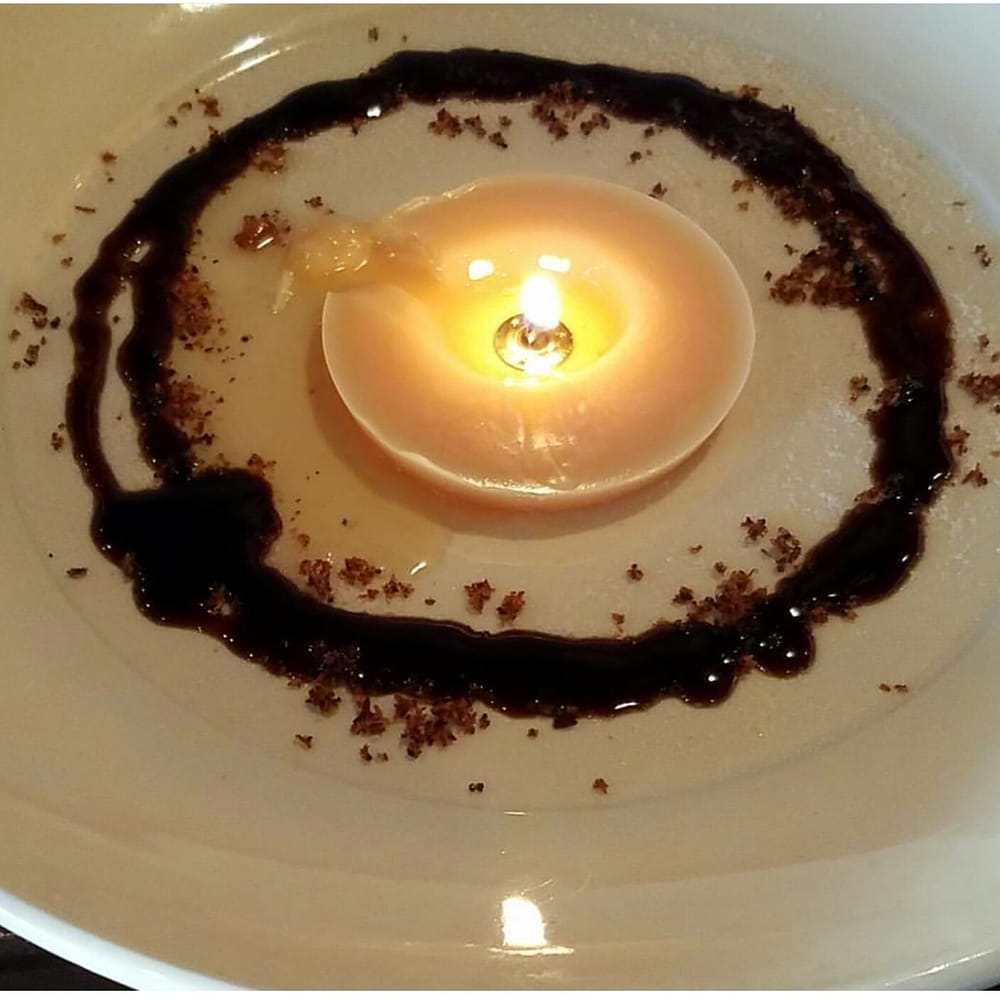 bacon fat candle with balsamic reduction served with toasted