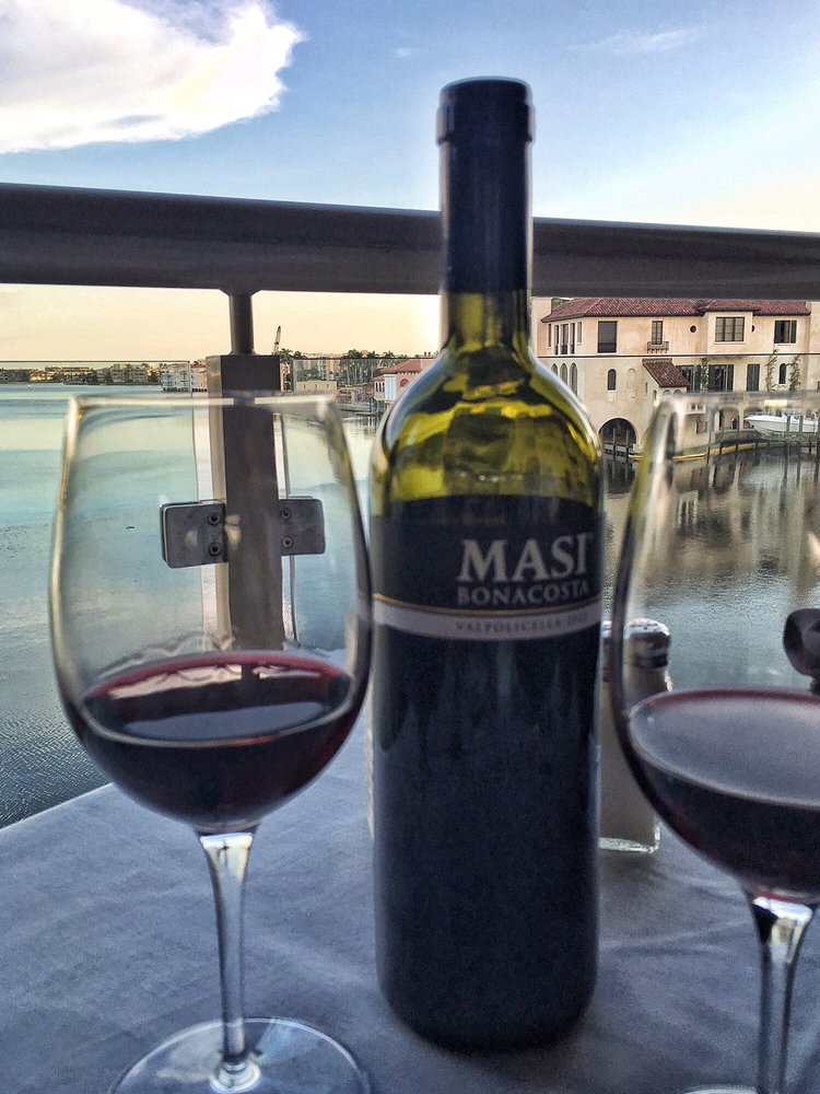 Photo of Bayside Seafood Grill & Bar - Naples, FL, United States. Italian red with the view