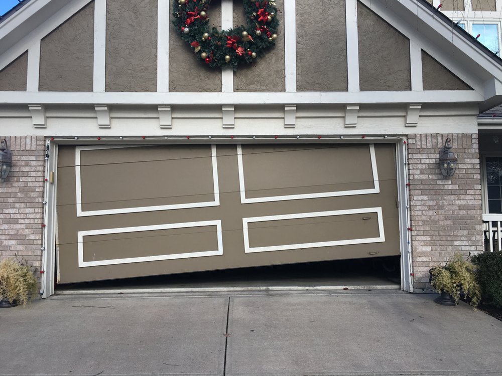 The Jammed Garage Door Yelp Photo Of Garage Door Guys Kansas City Ks United States The Jammed