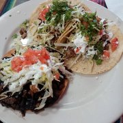 Photo of Ok Mr Pancho - Bronx, NY, United States. Beef tongue tostada and carnitas tacos