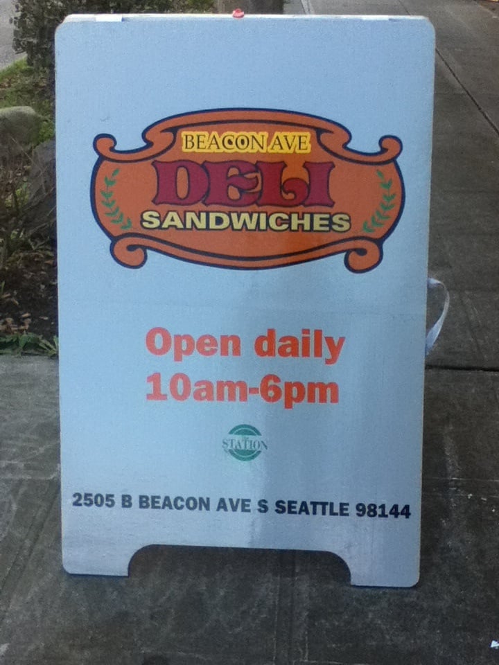 Sign on sidewalk Yelp