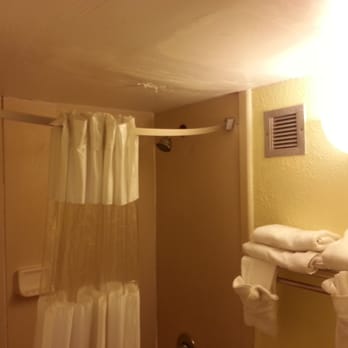 Bathroom Shower Curtain Rod That Was Installed Crooked So The