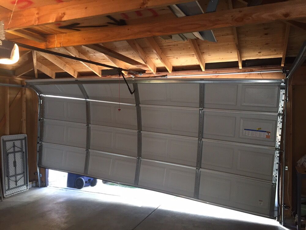This Door S Cable Broke And Bent The Track On Left Side Yelp Photo Of Ad Garage Doors And Locks Llc Chicago Il United States