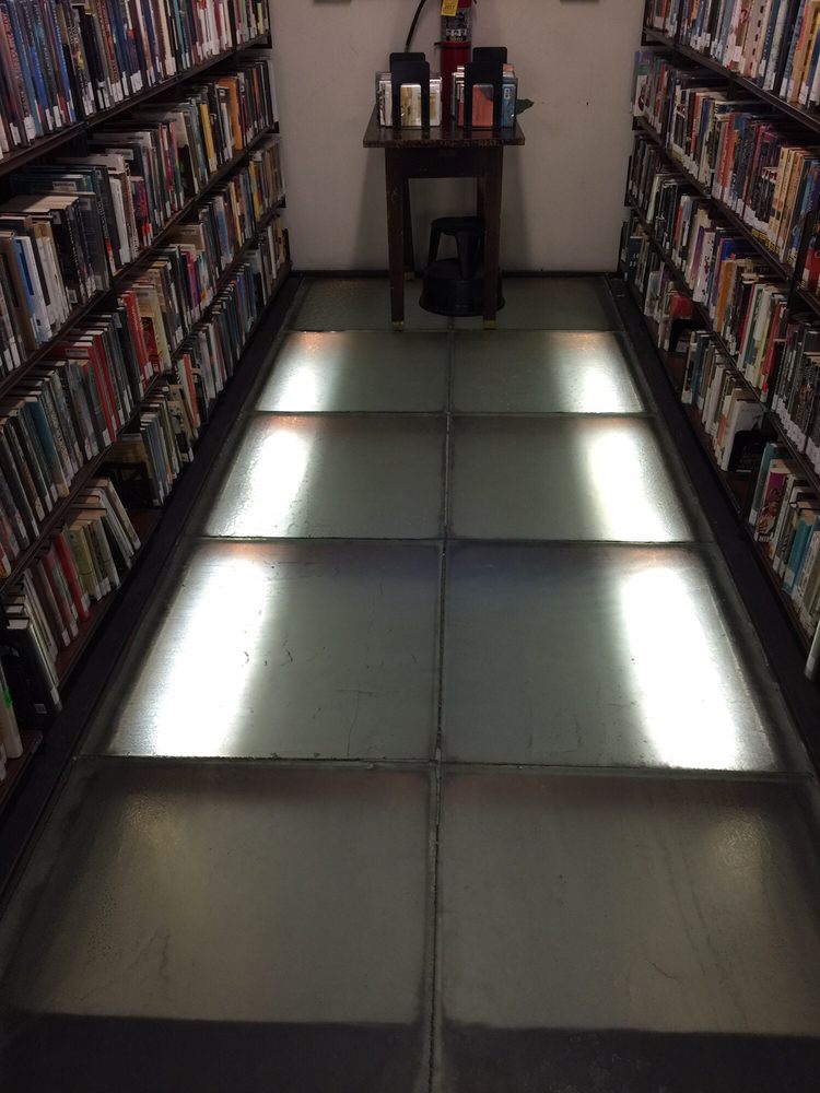 Translucent Glass Floor Brass Shelves On Mezzanine Supported By 23 Photos For Chicago Public Library Blackstone Branch